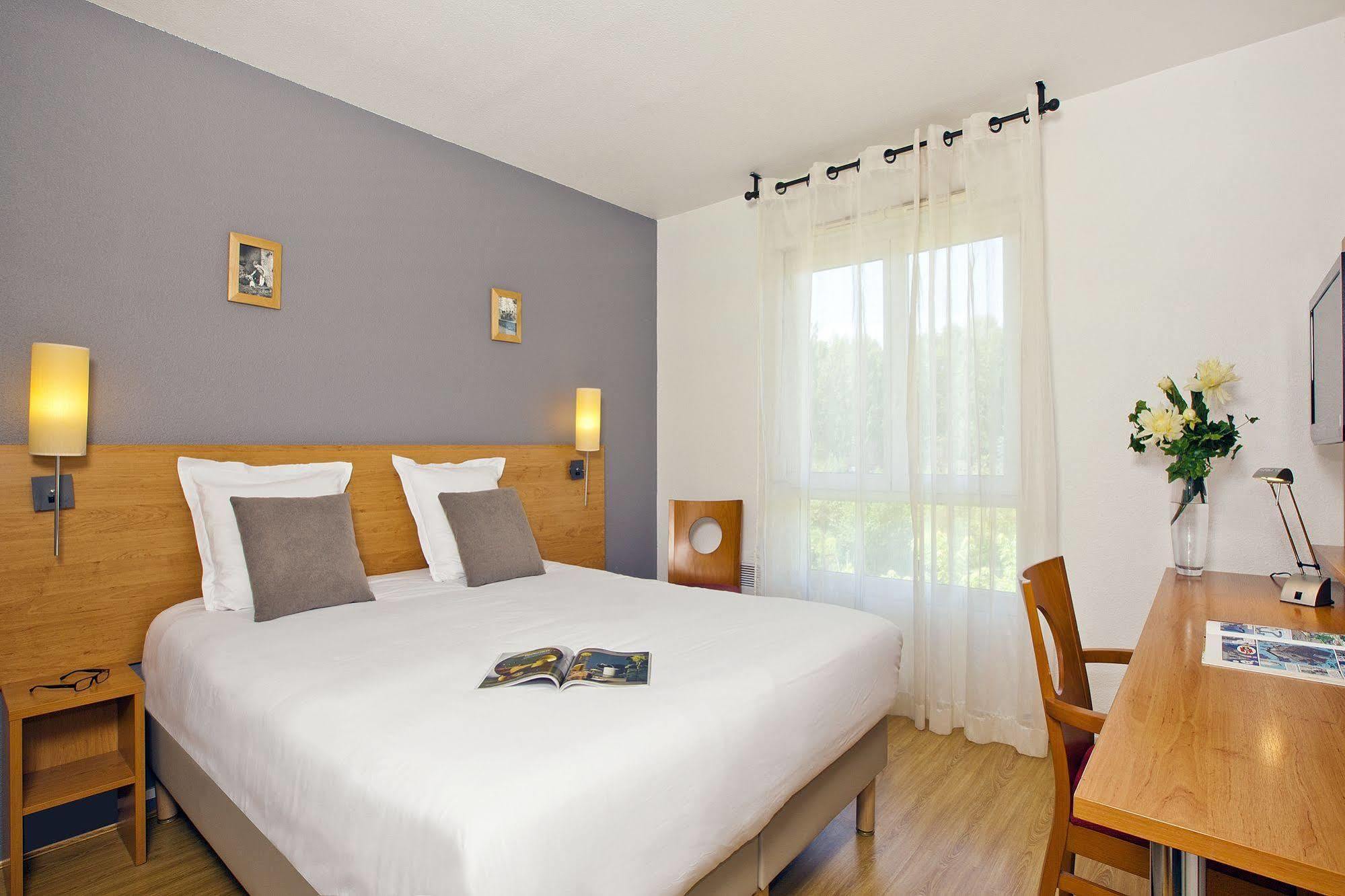 Aparthotel Sejours & Affaires Annecy Le Pont Neuf Cran-Gévrier Exterior foto